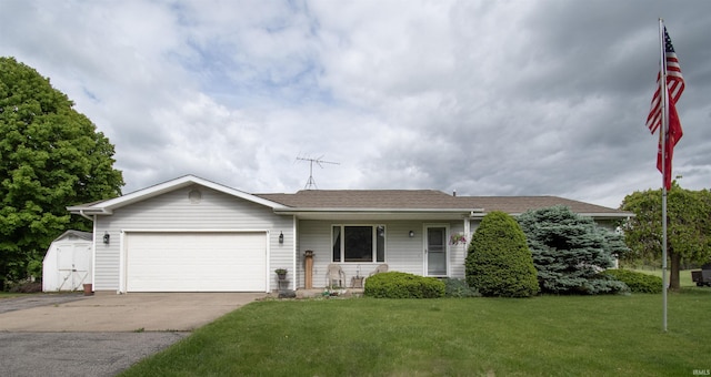 1220 N 290, Angola, IN 46703 - view of front of property featuring driveway, a garage, and a front yard