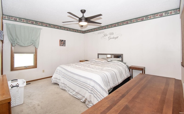 1220 N 290, Angola, IN 46703 - carpeted bedroom featuring baseboards and a ceiling fan