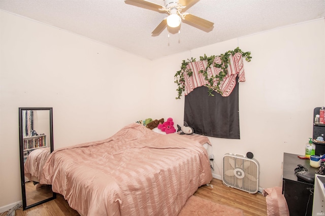 1220 N 290, Angola, IN 46703 - bedroom featuring light wood-style flooring and ceiling fan