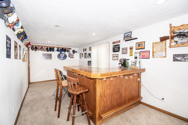 1220 N 290, Angola, IN 46703 - indoor dry bar featuring light carpet, baseboards, and recessed lighting