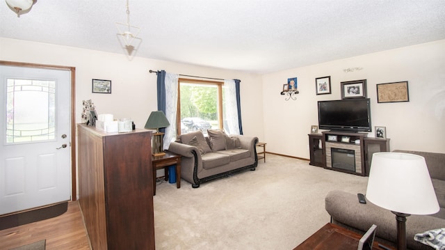 1220 N 290, Angola, IN 46703 - living area with light carpet and a textured ceiling