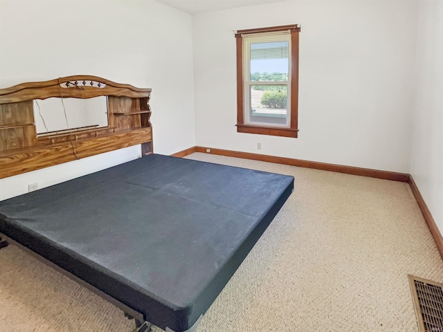 1029B Second Ave, Jasper, IN 47546 - bedroom featuring baseboards and carpet floors