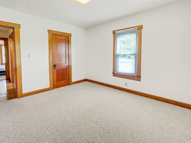 1029B Second Ave, Jasper, IN 47546 - unfurnished room with light carpet and baseboards