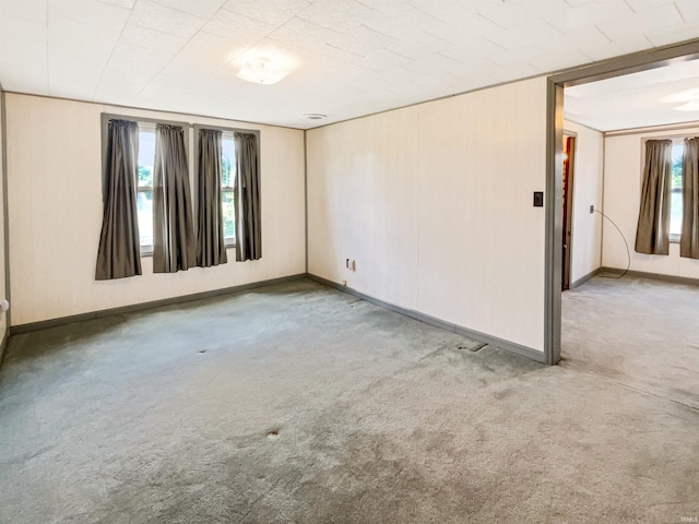 1029B Second Ave, Jasper, IN 47546 - carpeted spare room with plenty of natural light and baseboards