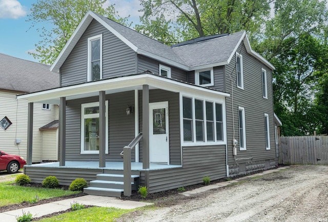 515 W Crawford St, Elkhart, IN 46514 - view of front of home with covered porch and roof with shingles