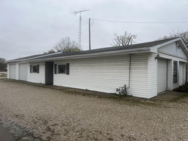 6386 E US Highway 50, Montgomery, IN 47558 - back of property featuring a garage