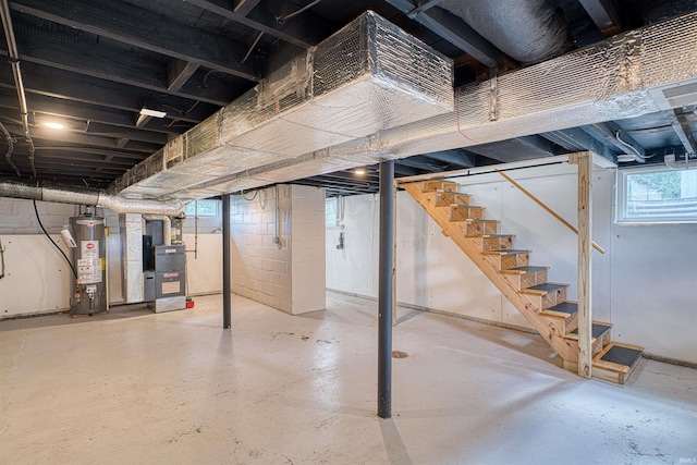 508 Polk St, Newburgh, IN 47630 - basement featuring water heater, heating unit, and stairs