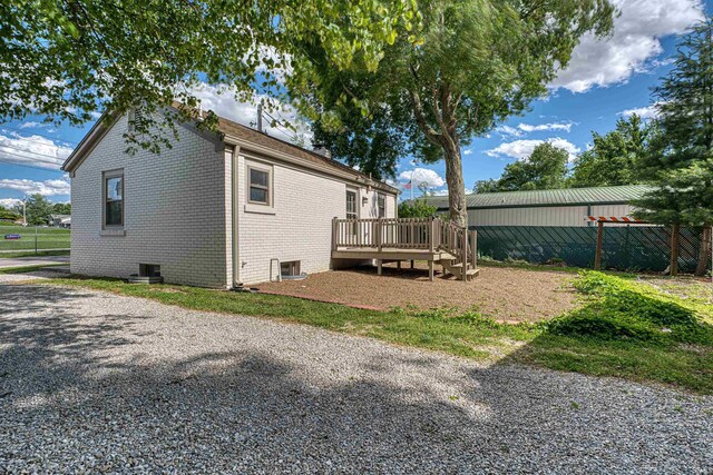 508 Polk St, Newburgh, IN 47630 - rear view of property with a wooden deck and brick siding