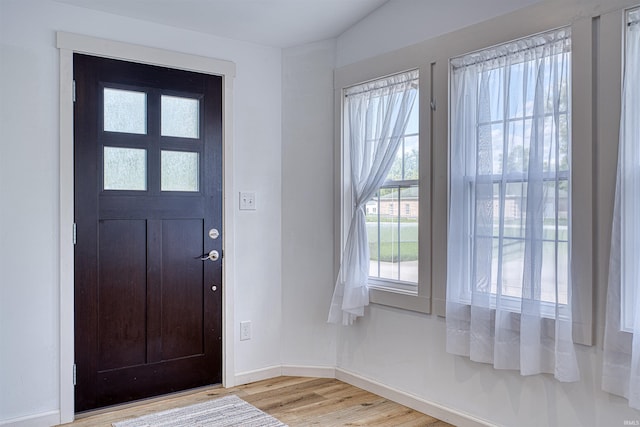 508 Polk St, Newburgh, IN 47630 - foyer with light wood-style flooring and baseboards