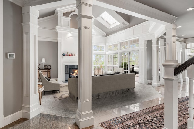 2314 Turnberry Ln, Fort Wayne, IN 46814 - living room with baseboards, a large fireplace, a towering ceiling, ornamental molding, and recessed lighting