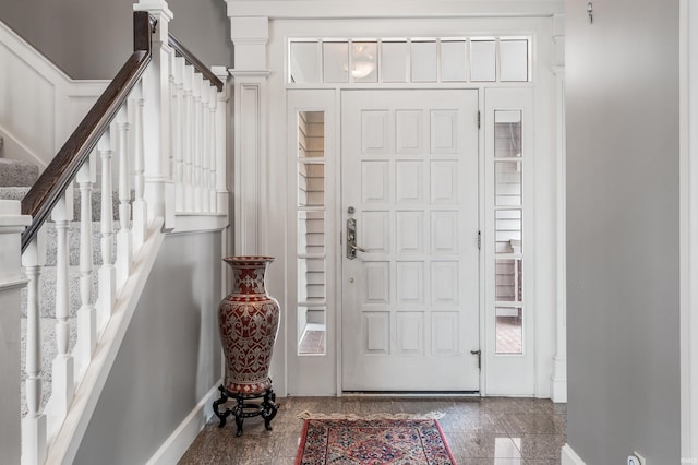 2314 Turnberry Ln, Fort Wayne, IN 46814 - foyer with granite floors, stairs, and baseboards