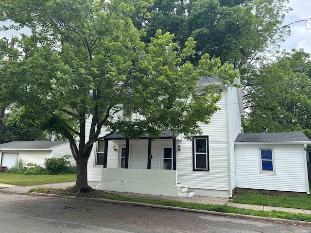 620-622 N 11th St, Lafayette, IN 47904 - obstructed view of property with a shingled roof and a porch