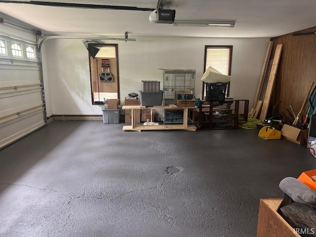 10704 Longwood Dr, Fort Wayne, IN 46845 - garage featuring a garage door opener