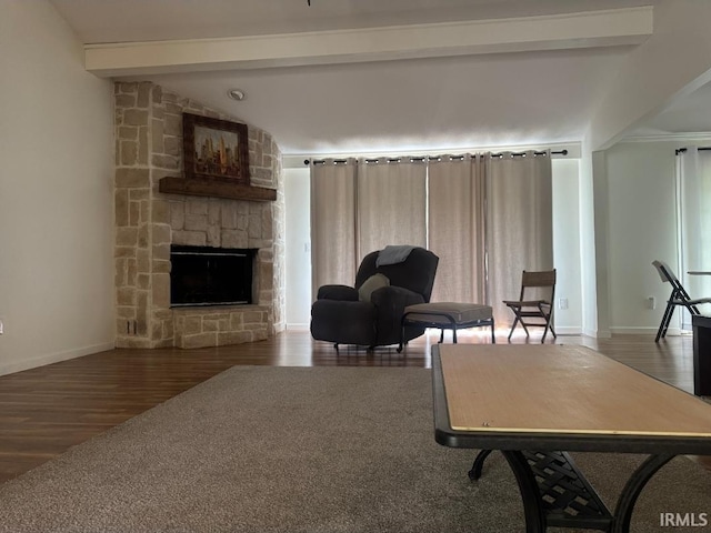 10704 Longwood Dr, Fort Wayne, IN 46845 - living area with wood finished floors, a fireplace, beamed ceiling, and baseboards