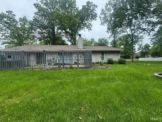 10704 Longwood Dr, Fort Wayne, IN 46845 - rear view of property featuring a chimney