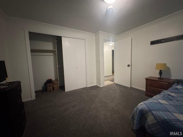 10704 Longwood Dr, Fort Wayne, IN 46845 - carpeted bedroom featuring ornamental molding, a closet, a textured ceiling, and baseboards