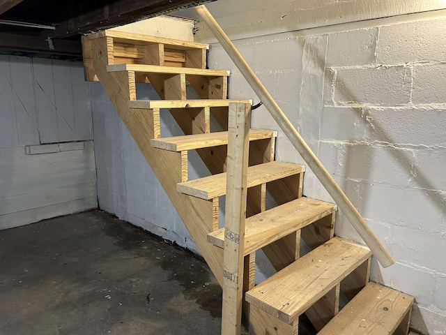1338 Dewey St, Jasper, IN 47546 - stairway featuring concrete flooring and concrete block wall