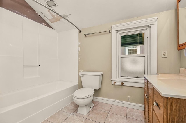 318 E Monroe St, Goshen, IN 46526 - bathroom featuring toilet, vanity, baseboards,  shower combination, and tile patterned floors