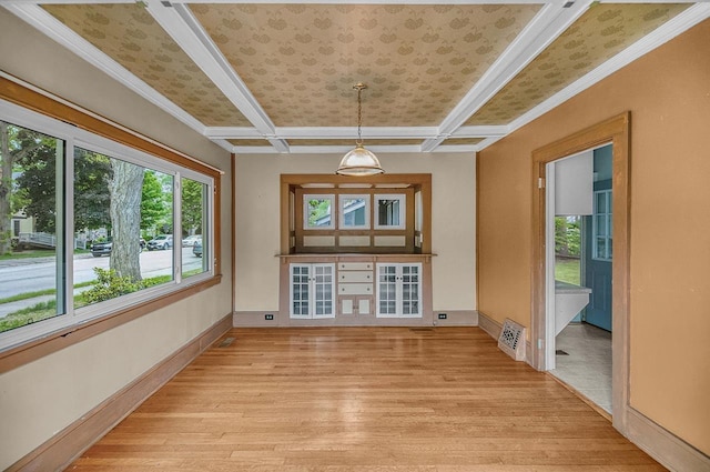 318 E Monroe St, Goshen, IN 46526 - unfurnished dining area featuring light wood-style floors, baseboards, and crown molding