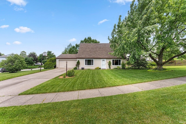 8809 Newberry Dr, Fort Wayne, IN 46825 - ranch-style house featuring driveway, a garage, and roof with shingles