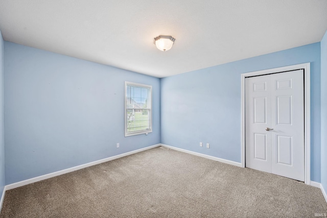 13849 Old Colony Dr, Granger, IN 46530 - unfurnished bedroom with carpet and baseboards