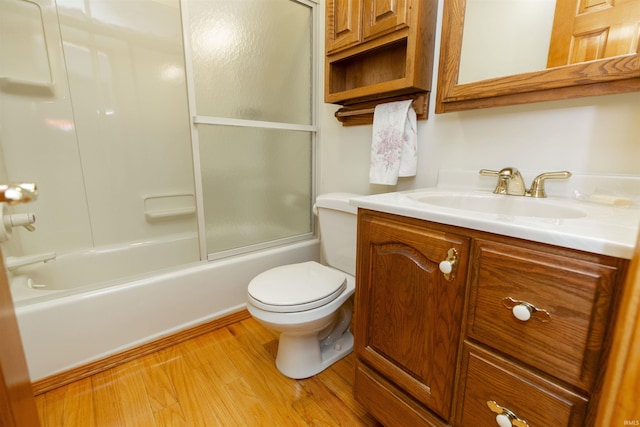 54188 Terrace Ln, South Bend, IN 46635 - bathroom featuring vanity, wood finished floors, toilet, and shower / bathtub combination