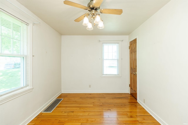 54188 Terrace Ln, South Bend, IN 46635 - spare room with light wood-style floors, baseboards, and ceiling fan