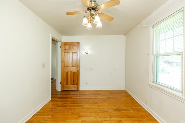 54188 Terrace Ln, South Bend, IN 46635 - empty room featuring light wood-type flooring, baseboards, and a ceiling fan