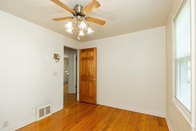 54188 Terrace Ln, South Bend, IN 46635 - empty room featuring baseboards, light wood-style flooring, and a ceiling fan