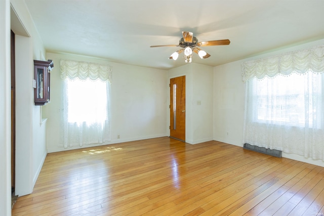 54188 Terrace Ln, South Bend, IN 46635 - empty room featuring ceiling fan and light wood-style flooring