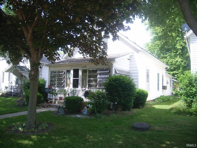 113 N 5th St, Decatur, IN 46733 - view of front of home featuring a front yard