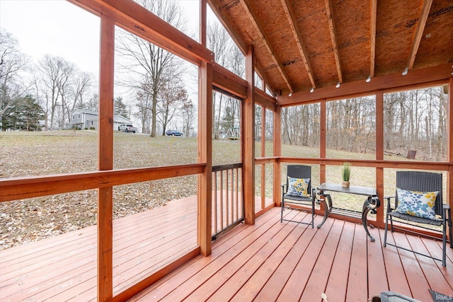 5959 W Delap Rd, Ellettsville, IN 47429 - unfurnished sunroom featuring vaulted ceiling