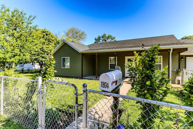 1804 W 14th St, Muncie, IN 47302 - ranch-style house with a gate
