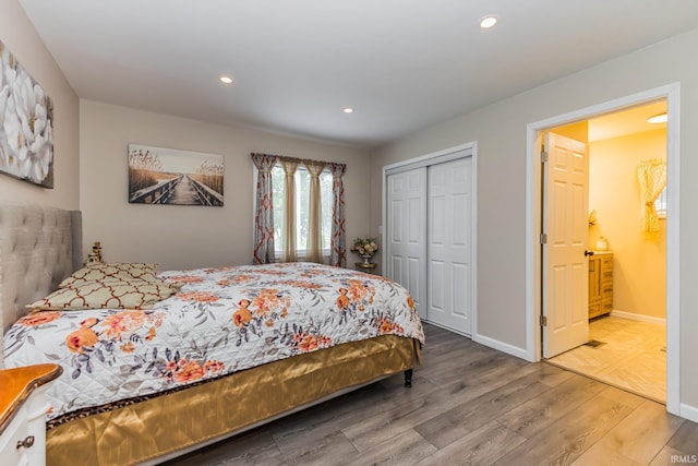 1804 W 14th St, Muncie, IN 47302 - bedroom with wood finished floors, a closet, recessed lighting, and baseboards
