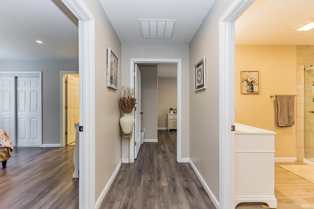 1804 W 14th St, Muncie, IN 47302 - hallway with dark wood-type flooring, baseboards, and recessed lighting