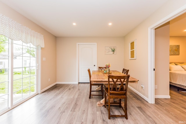 1804 W 14th St, Muncie, IN 47302 - dining space with plenty of natural light, light wood finished floors, baseboards, and recessed lighting
