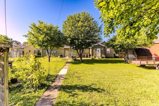 1804 W 14th St, Muncie, IN 47302 - view of yard featuring entry steps and an outbuilding