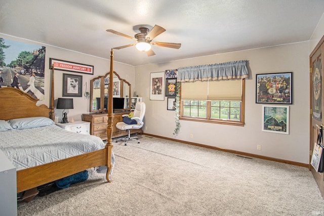 51178 Ashley Dr, Granger, IN 46530 - carpeted bedroom featuring baseboards and a ceiling fan