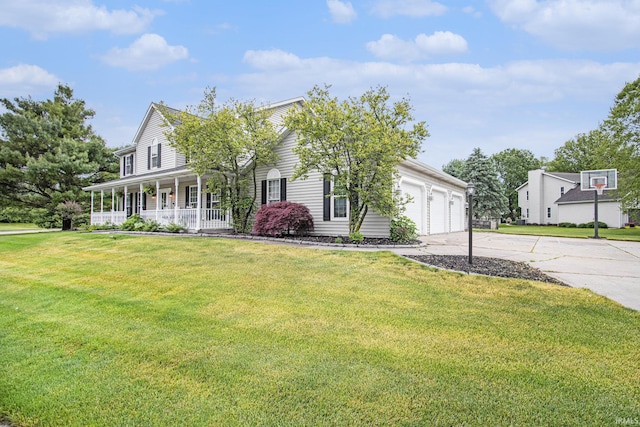 51178 Ashley Dr, Granger, IN 46530 - view of front of property featuring covered porch, concrete driveway, a front lawn, and a garage