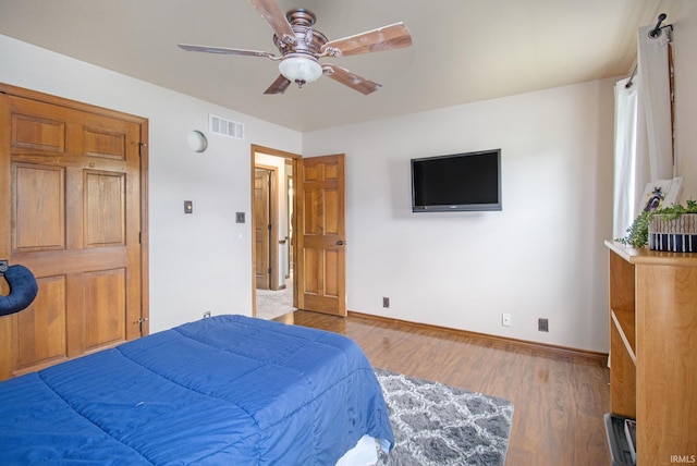 51178 Ashley Dr, Granger, IN 46530 - bedroom featuring wood finished floors, baseboards, and ceiling fan