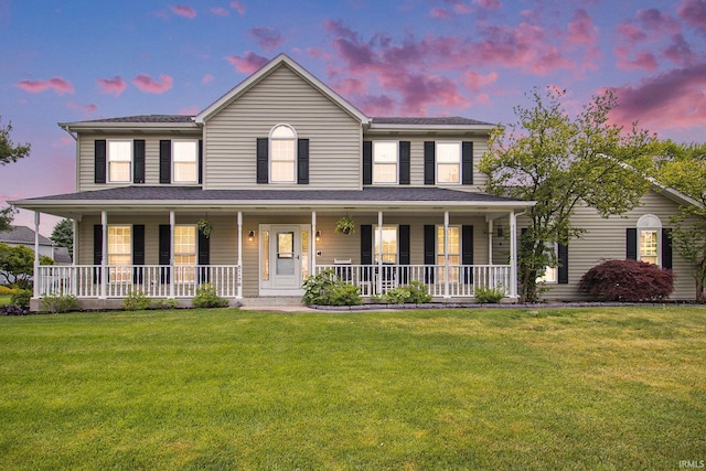 51178 Ashley Dr, Granger, IN 46530 - colonial house featuring covered porch and a front yard