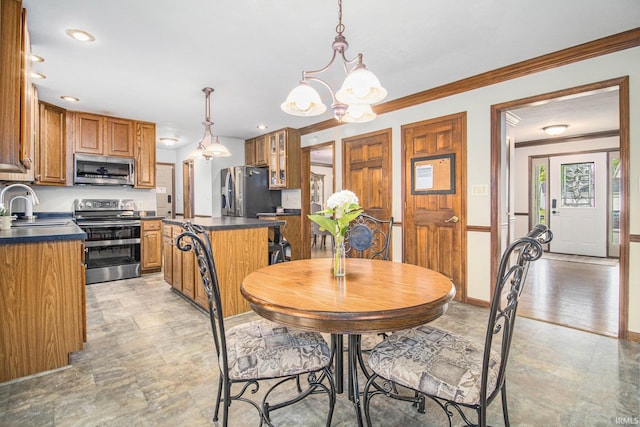 51178 Ashley Dr, Granger, IN 46530 - dining room featuring a chandelier, crown molding, and recessed lighting