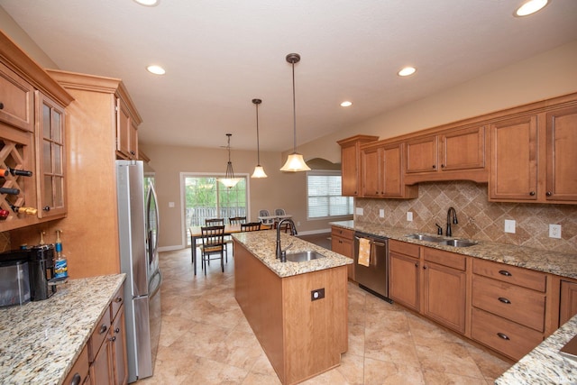 6118 Mackenzie Ct, West Lafayette, IN 47906 - kitchen with a sink, stainless steel appliances, a kitchen island with sink, brown cabinets, and recessed lighting