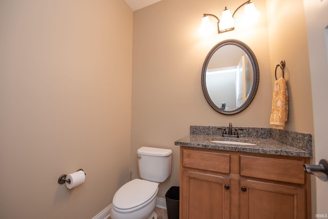6118 Mackenzie Ct, West Lafayette, IN 47906 - half bathroom with toilet, vanity, and baseboards