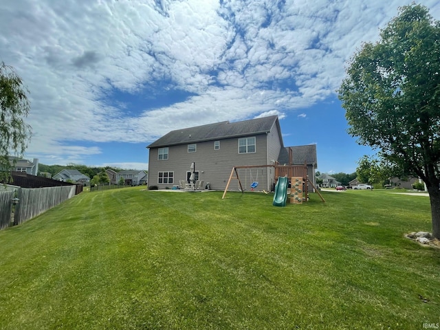 6118 Mackenzie Ct, West Lafayette, IN 47906 - rear view of house featuring a playground