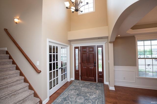 6118 Mackenzie Ct, West Lafayette, IN 47906 - foyer entrance with plenty of natural light, a chandelier, and wood finished floors
