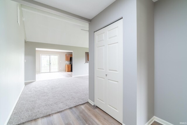 3827 Winter Raven Trl, Fort Wayne, IN 46818 - hall with light wood-style floors and baseboards