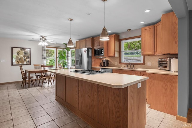 1437 W State Road 56th Rd, Jasper, IN 47546 - kitchen featuring appliances with stainless steel finishes, a sink, plenty of natural light, light countertops, and recessed lighting