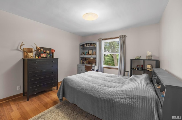 1437 W State Road 56th Rd, Jasper, IN 47546 - bedroom with wood finished floors and baseboards