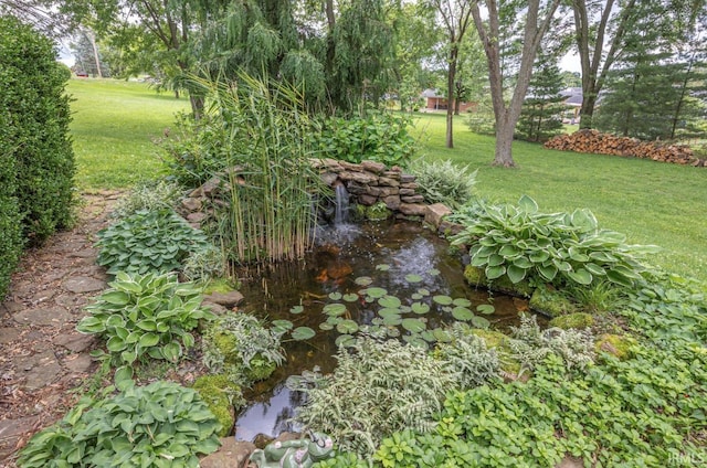 1437 W State Road 56th Rd, Jasper, IN 47546 - view of grassy yard featuring a garden pond